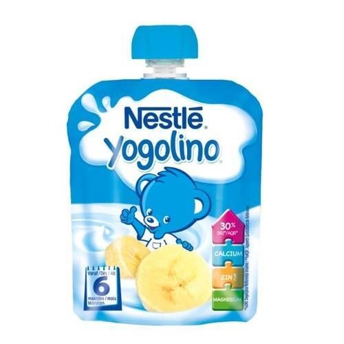 Sachet Nestlé Yogolino Banane. Design bleu et blanc avec tranches de banane et ours. Contient 30% de calcium.