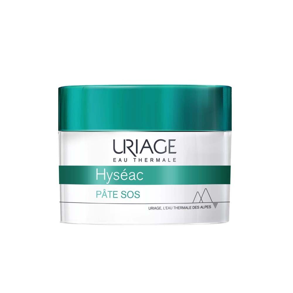 Pot de crème à couvercle bleu. Inscription : URIAGE, Hyséac, Pâte SOS. Récipient blanc avec texte vert.