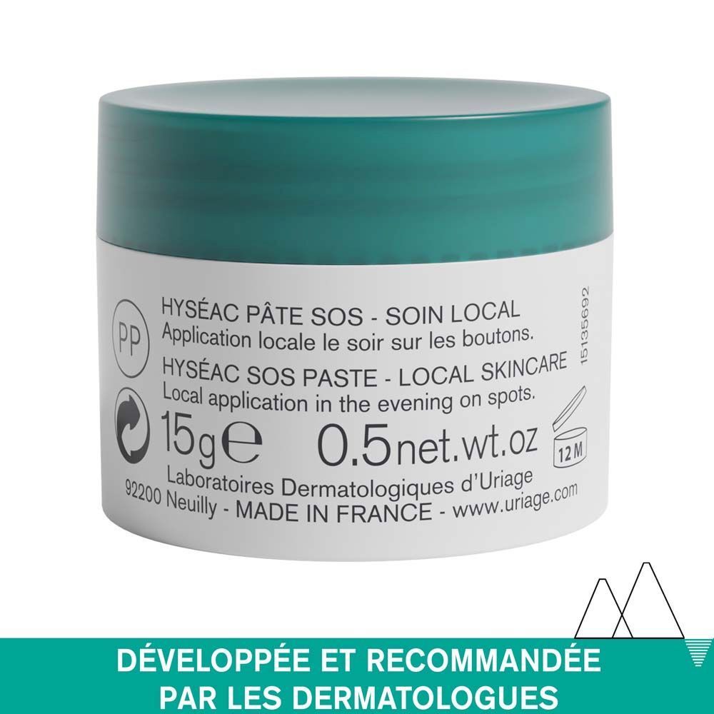 Pot de crème à couvercle bleu. Inscription : URIAGE, Hyséac, Pâte SOS. Récipient blanc avec texte vert.