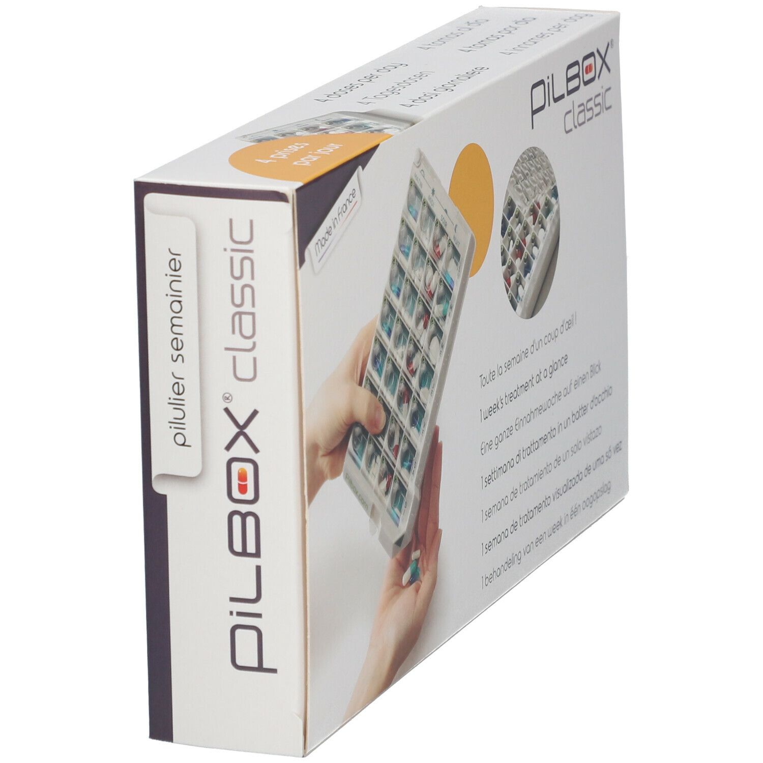 Boîte PILBOX Classic en biais. Contient un pilulier hebdomadaire. Inscription: 4 prises par jour. Avec cercle jaune.