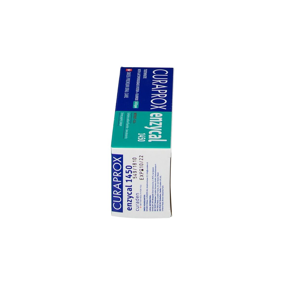 Boîte de dentifrice, bleu-turquoise. Nom et détails du produit. Drapeau suisse. Texte en allemand.