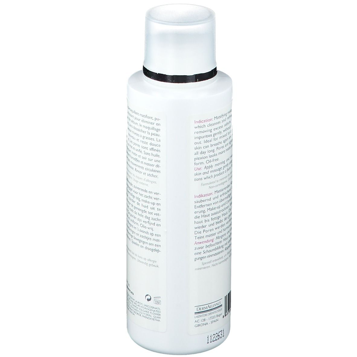 Achterkant van een witte, cilindrische fles. Tekst in meerdere talen. Informatie over gebruik en ingrediënten.