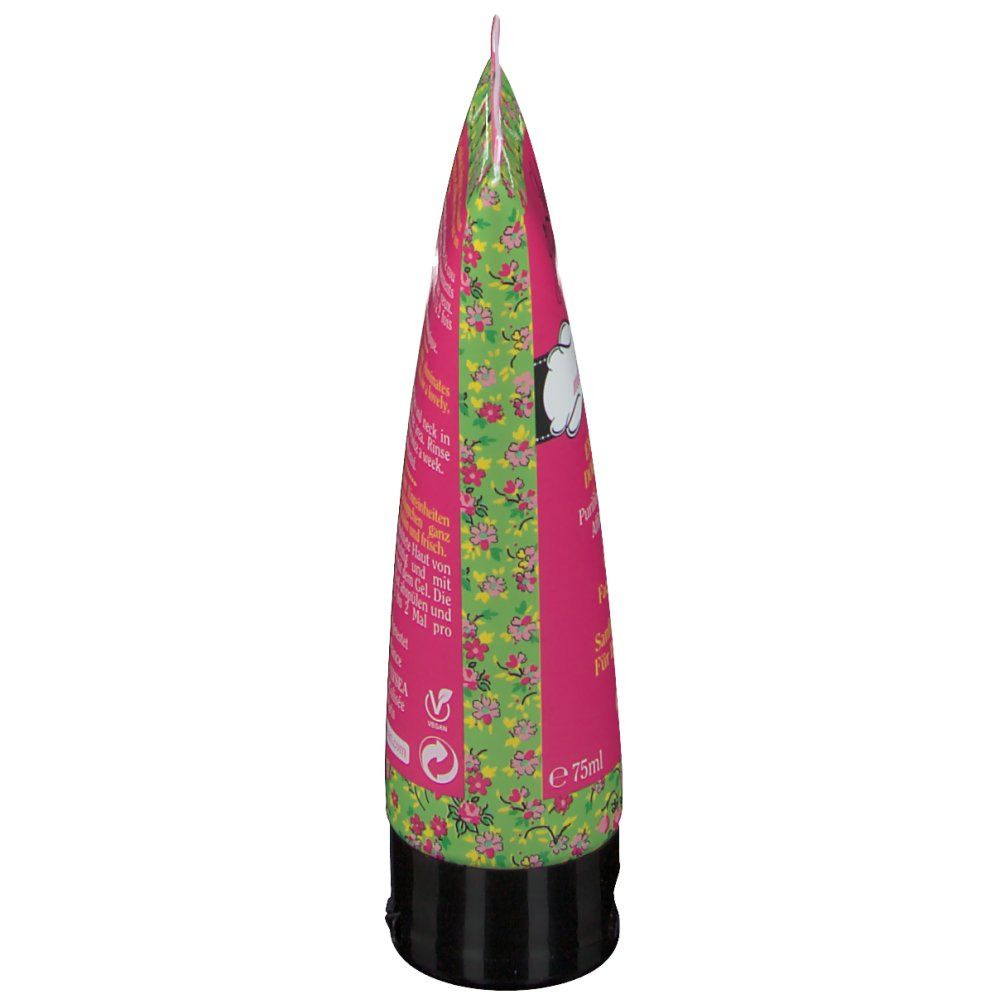Zijaanzicht van de tube. Roze met bloemenpatroon. Zwarte dop. Tekst.