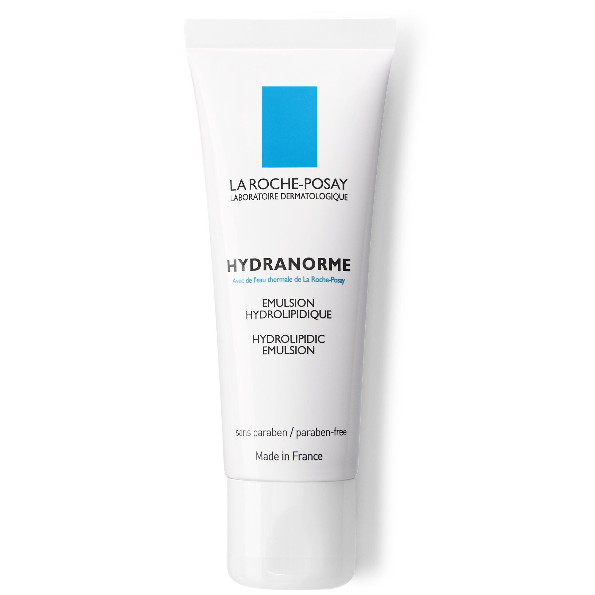 Tube blanc avec rectangle bleu et texte. Nom du produit: HYDRANORME. Émulsion pour le visage.