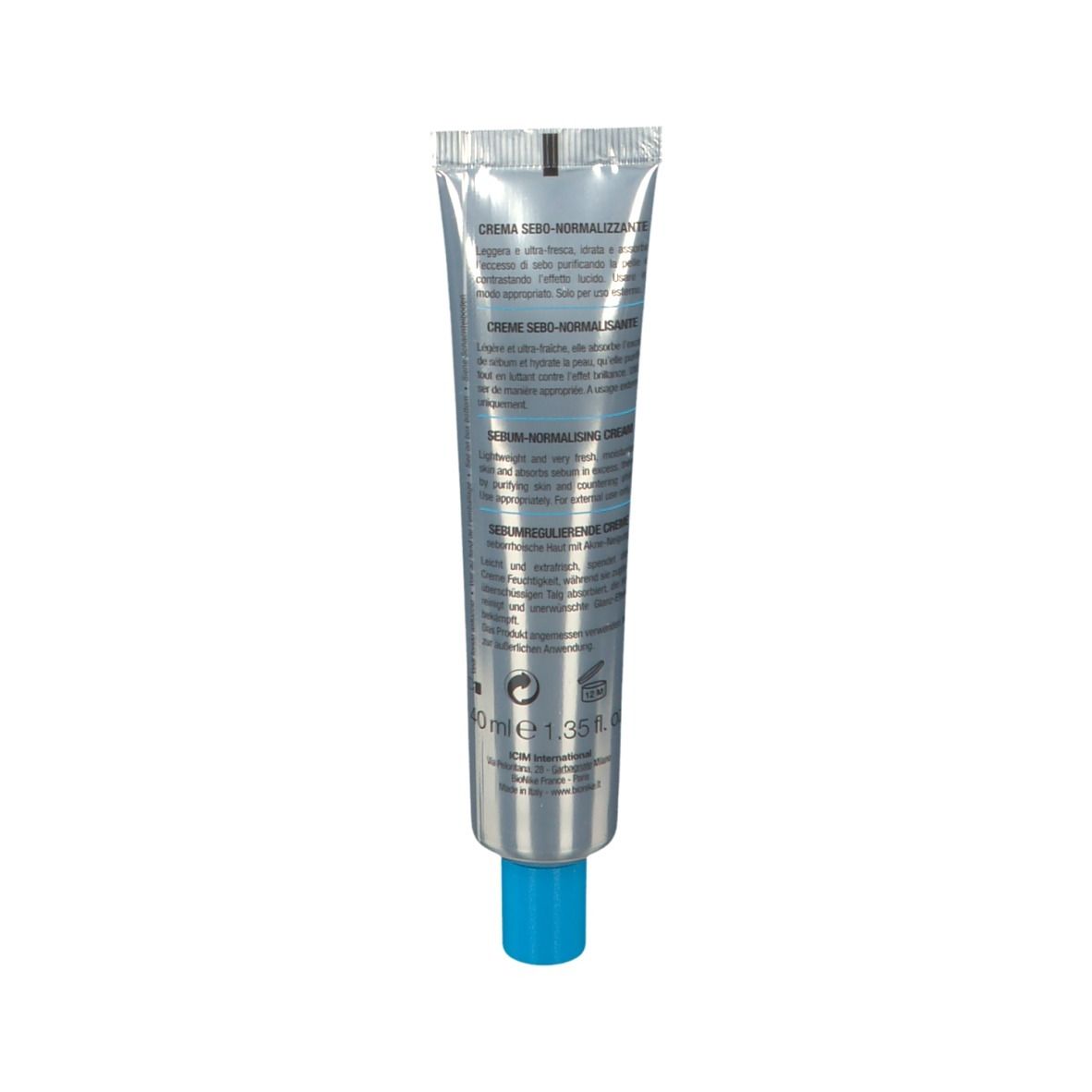 Tube de crème avec bouchon bleu. Texte: Crème sébo-normalisante. Inscription: 40 ml e 1.35 fl. oz.