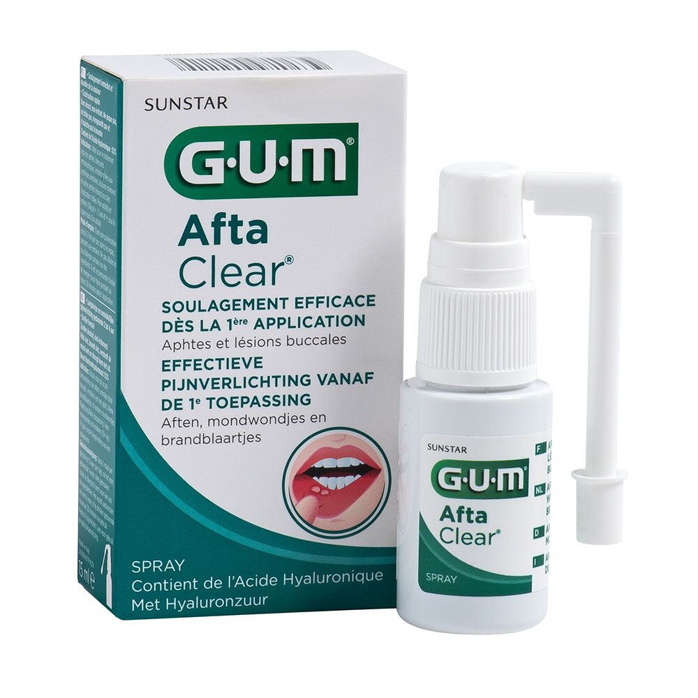 Spray GUM Afta Clear et emballage. Spray blanc avec étiquette verte. Emballage avec nom du produit et texte en plusieurs langues.