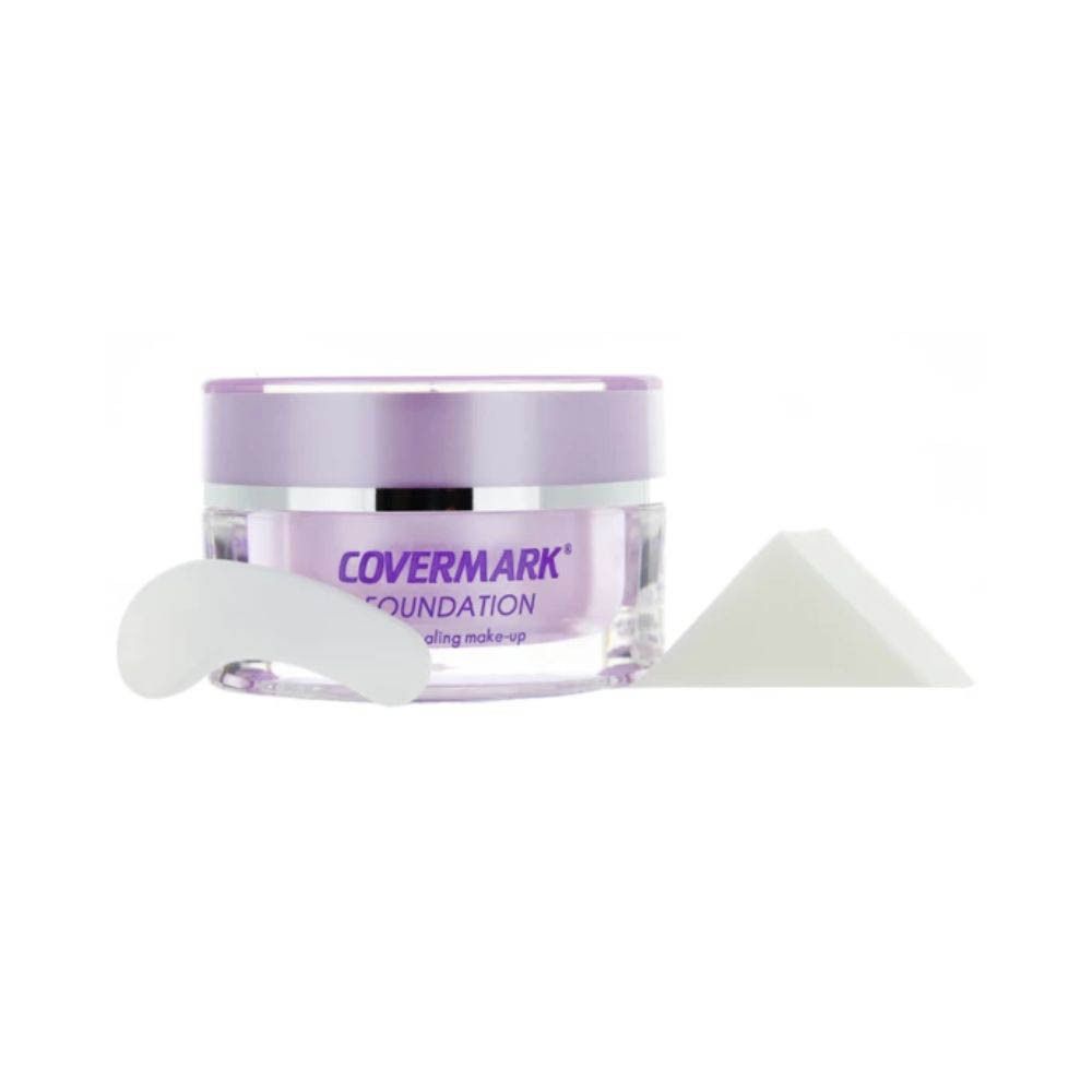 COVERMARK® Classic Foundation Nr. 8a. Produit, éponge et applicateur. Nom du produit et texte Foundation visibles.