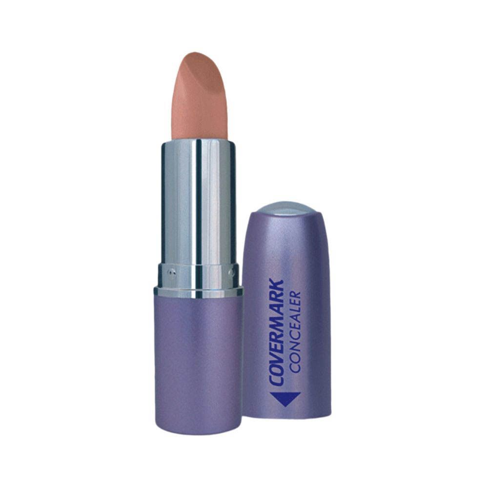 COVERMARK® Concealer Nr. 1, teinte Nr. 1, en stick violet et argenté. Le correcteur est visible.