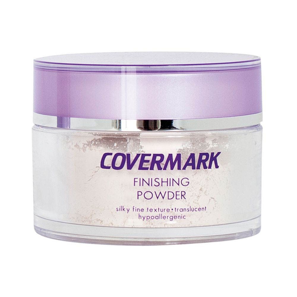 COVERMARK Finishing Puder. Pot rond transparent avec couvercle violet. Nom du produit et logo sur le devant.