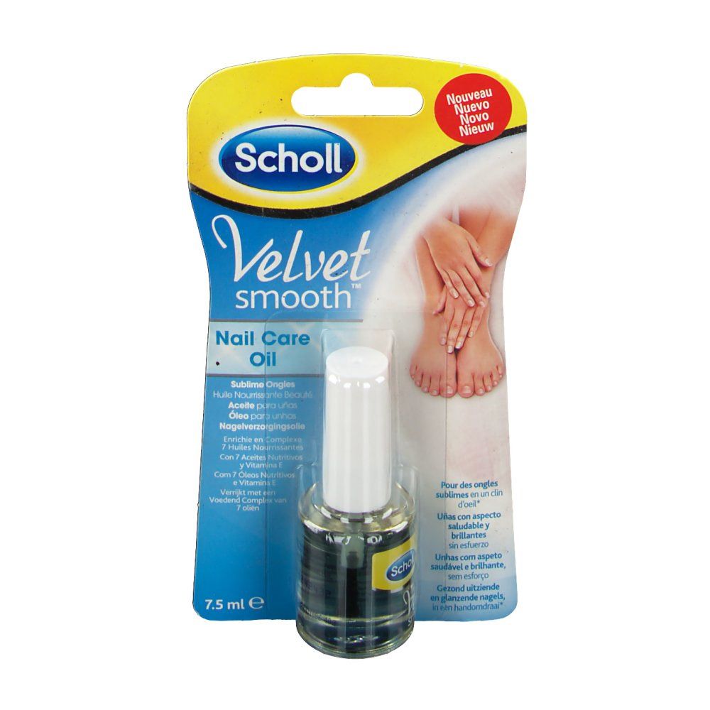 Huile pour les ongles Scholl Velvet Smooth, en emballage. Flacon avec bouchon blanc. Inscription: Velvet Smooth Nail Care Oil.
