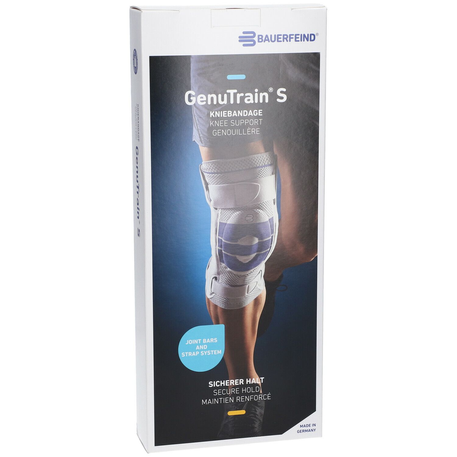 Genouillère BAUERFEIND® GenuTrain® S sur une jambe. Genouillère blanche et bleue avec sangles. Texte: Kniebandage, Knie-Support, Genuillère.