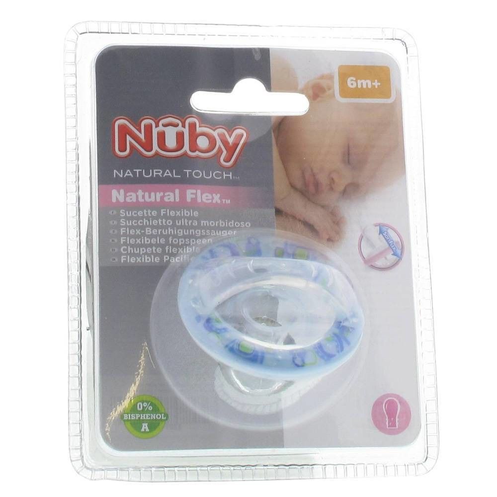 Sucette bleue transparente dans un emballage blister. Inscription : Nûby, Natural Touch, Natural Flex. Convient aux bébés de 6 mois et plus.