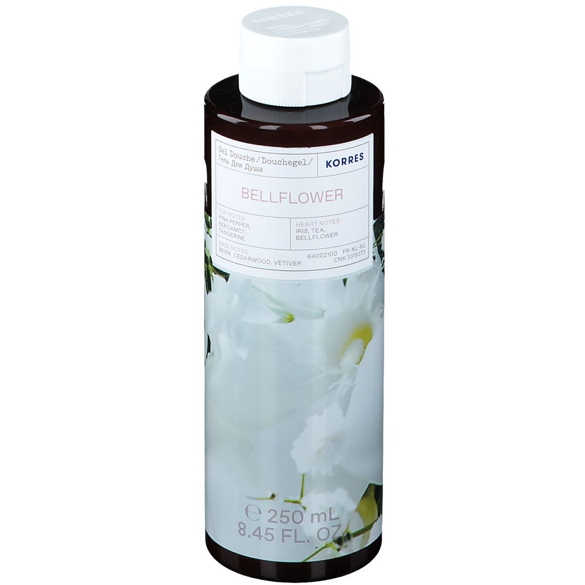 Flacon marron avec bouchon blanc. Étiquette avec nom du produit et motif floral. Contenance : 250 ml.