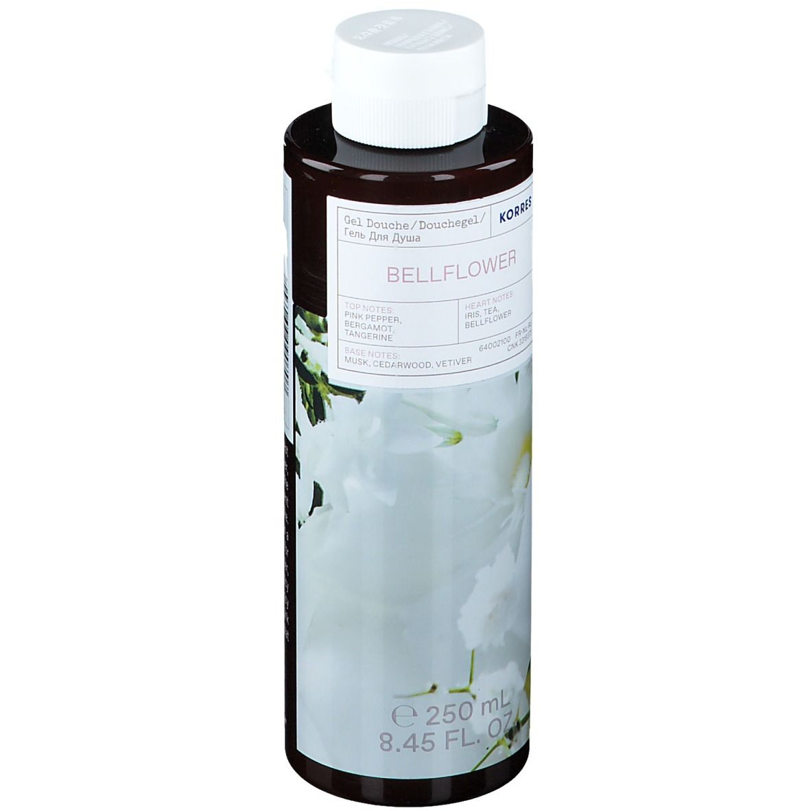 Flacon marron avec bouchon blanc. Étiquette avec nom du produit et motif floral. Contenance : 250 ml.
