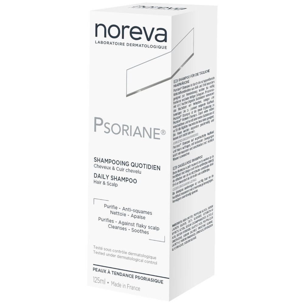 Weiße Schachtel mit Shampoo. Marke Noreva, Produktname Psoriane, tägliches Shampoo für Haar und Kopfhaut. Text in Französisch.