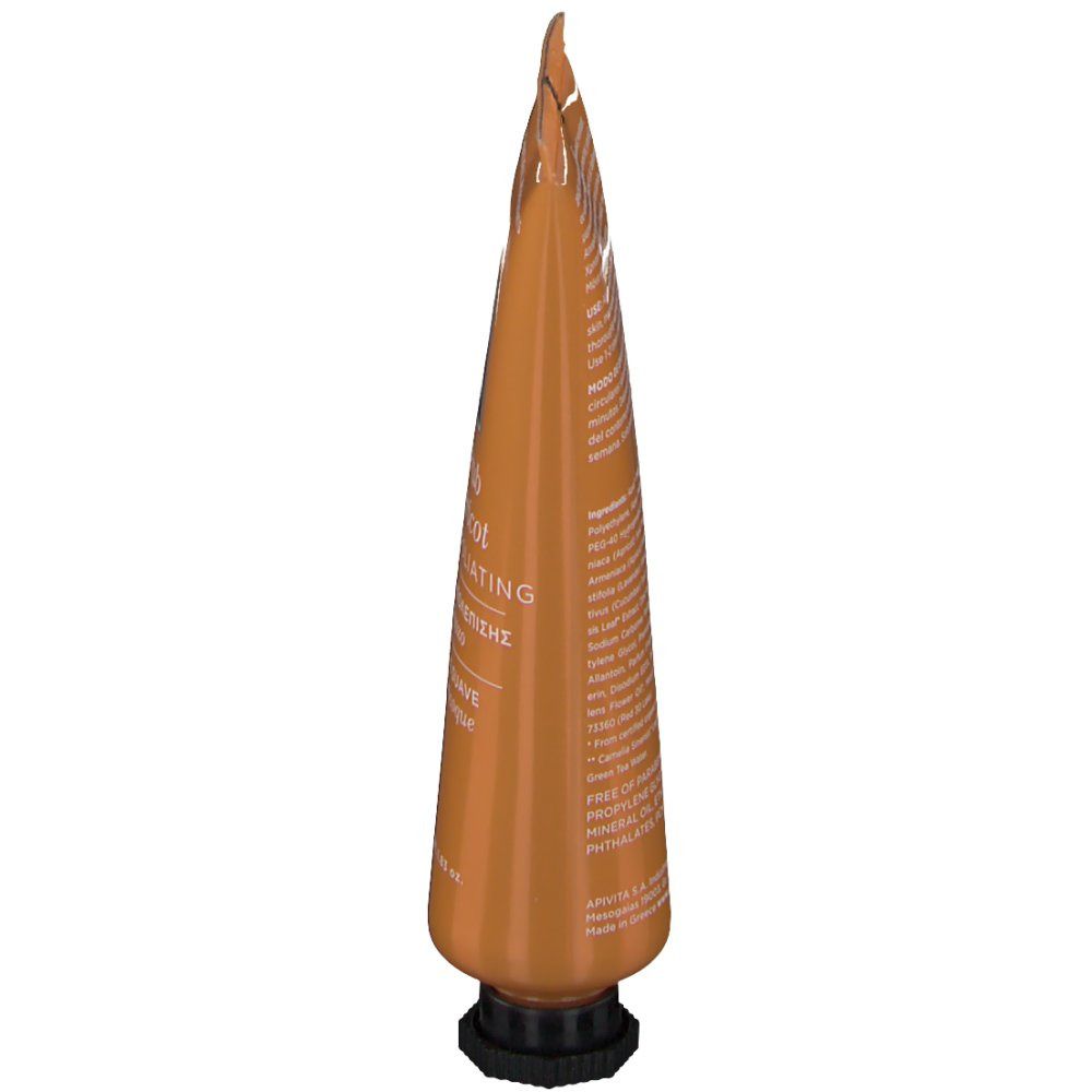 Tube orange, vue oblique du dessus. Bouchon noir. Inscription au dos. Nom du produit non visible.