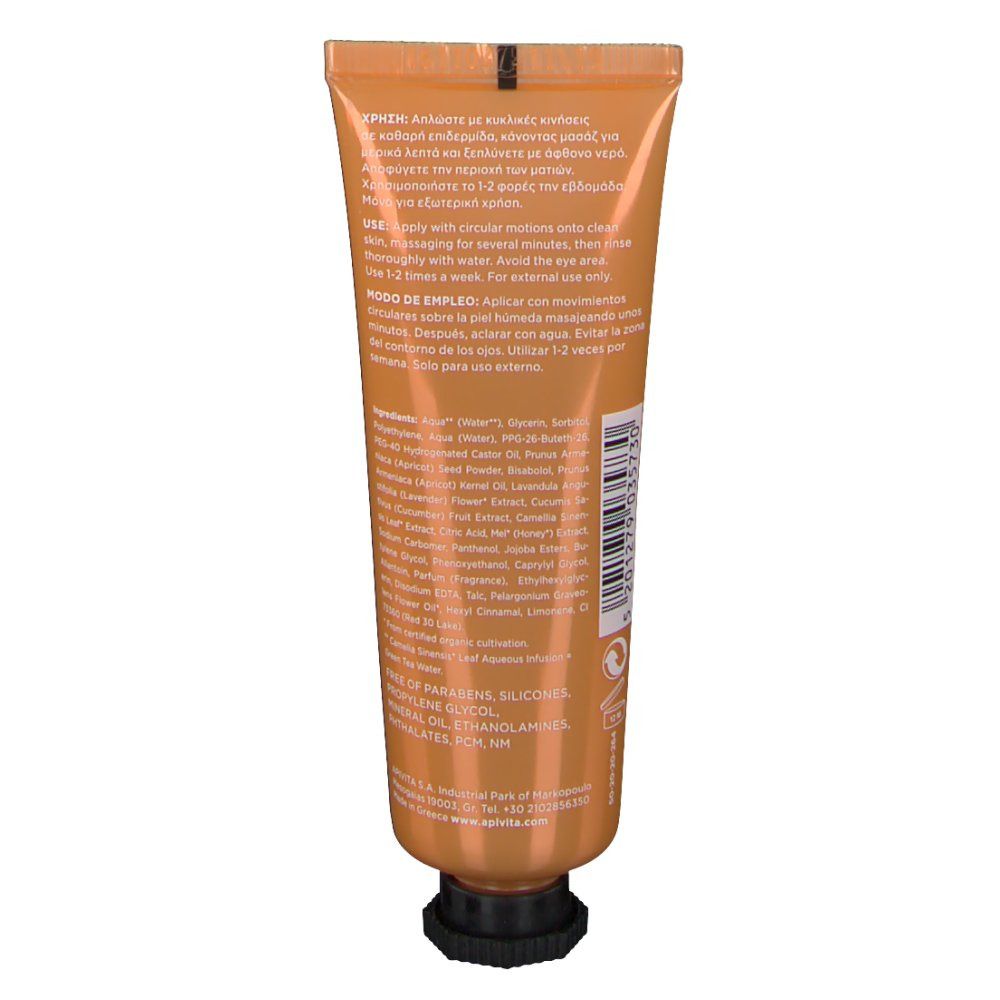 Dos d'un tube orange. Bouchon noir. Texte avec ingrédients et instructions d'utilisation. Nom du produit non visible.
