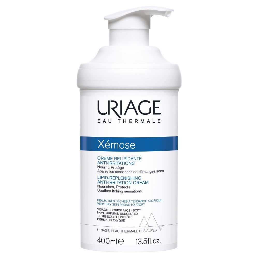 Witte fles Uriage Xémose. Crème relipidante anti-irritations. Blauwe accenten.