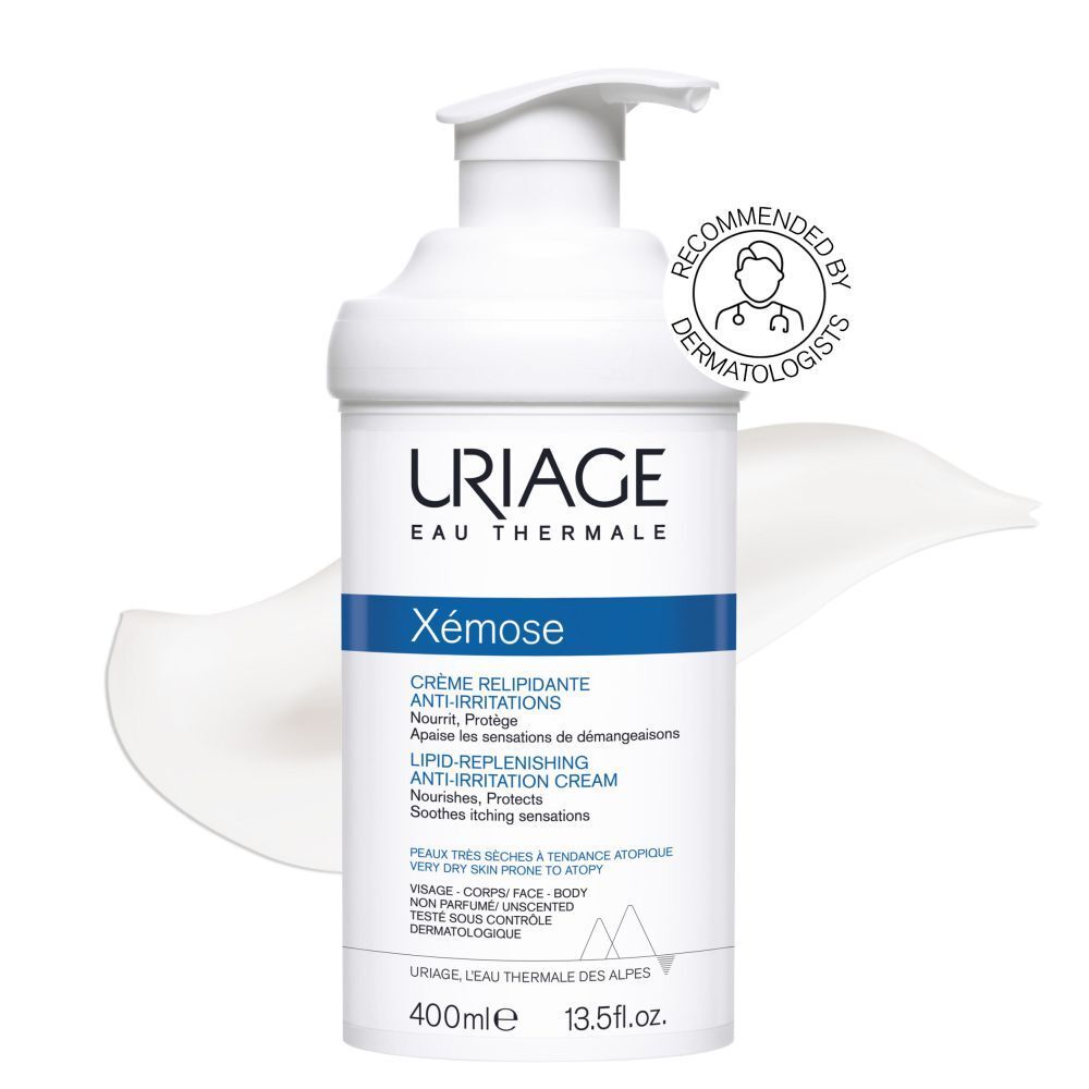 Witte fles Uriage Xémose. Crème relipidante anti-irritations. Blauwe accenten. Aanbevolen.