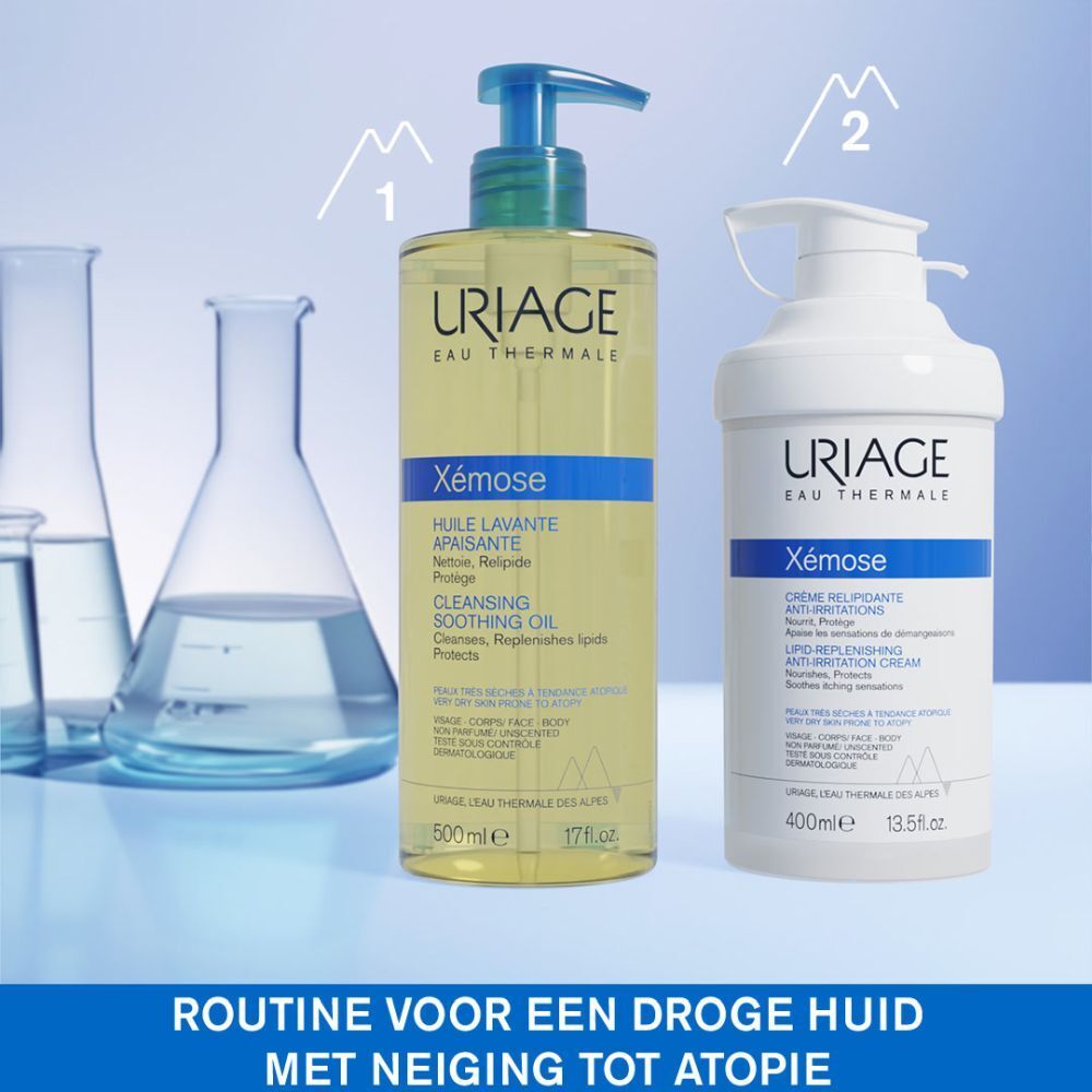 Witte fles Uriage Xémose. Crème relipidante anti-irritations. Blauwe accenten.