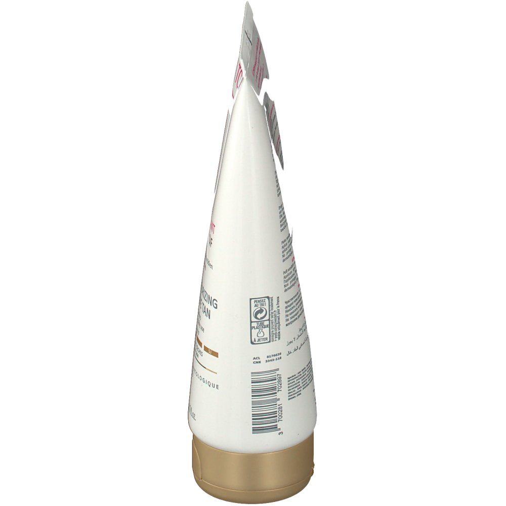 Zijaanzicht van de TOPICREM Ultra Hydratant progressive Bräune tube. Wit, roze en bruine details. Gouden sluiting.