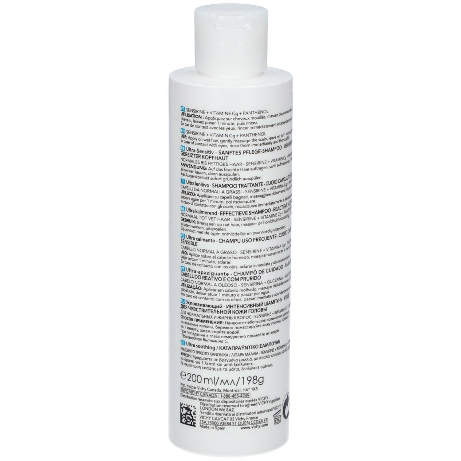Rückseite der weißen Flasche. Text in mehreren Sprachen. Informationen zum Produkt und Hersteller.