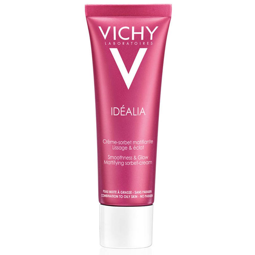 Tube rose avec bouchon blanc. Inscriptions: VICHY, IDÉALIA. Nom du produit et traduction anglaise. Texte: Peaux mixtes à grasses, sans parabène.
