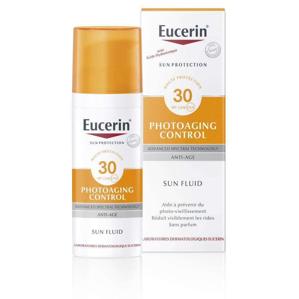 Eucerin Photoaging Control Sun Fluid LSF 30. Flacon blanc et bouchon jaune, emballage. Texte: Sun Protection, Photoaging Control.