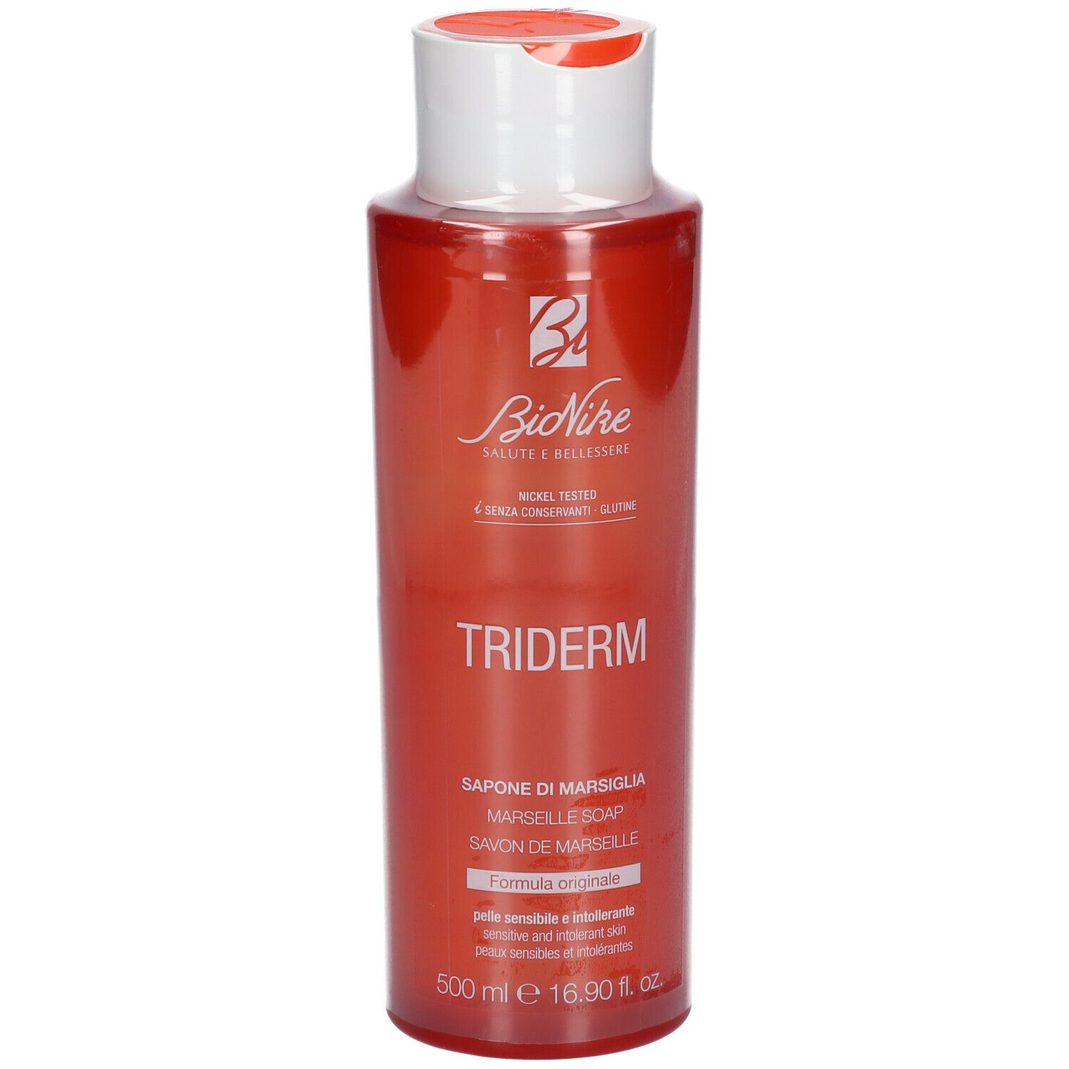 Flacon rouge avec bouchon blanc. Inscription: TRIDERM, Marseille Soap. Marque: BioNike.