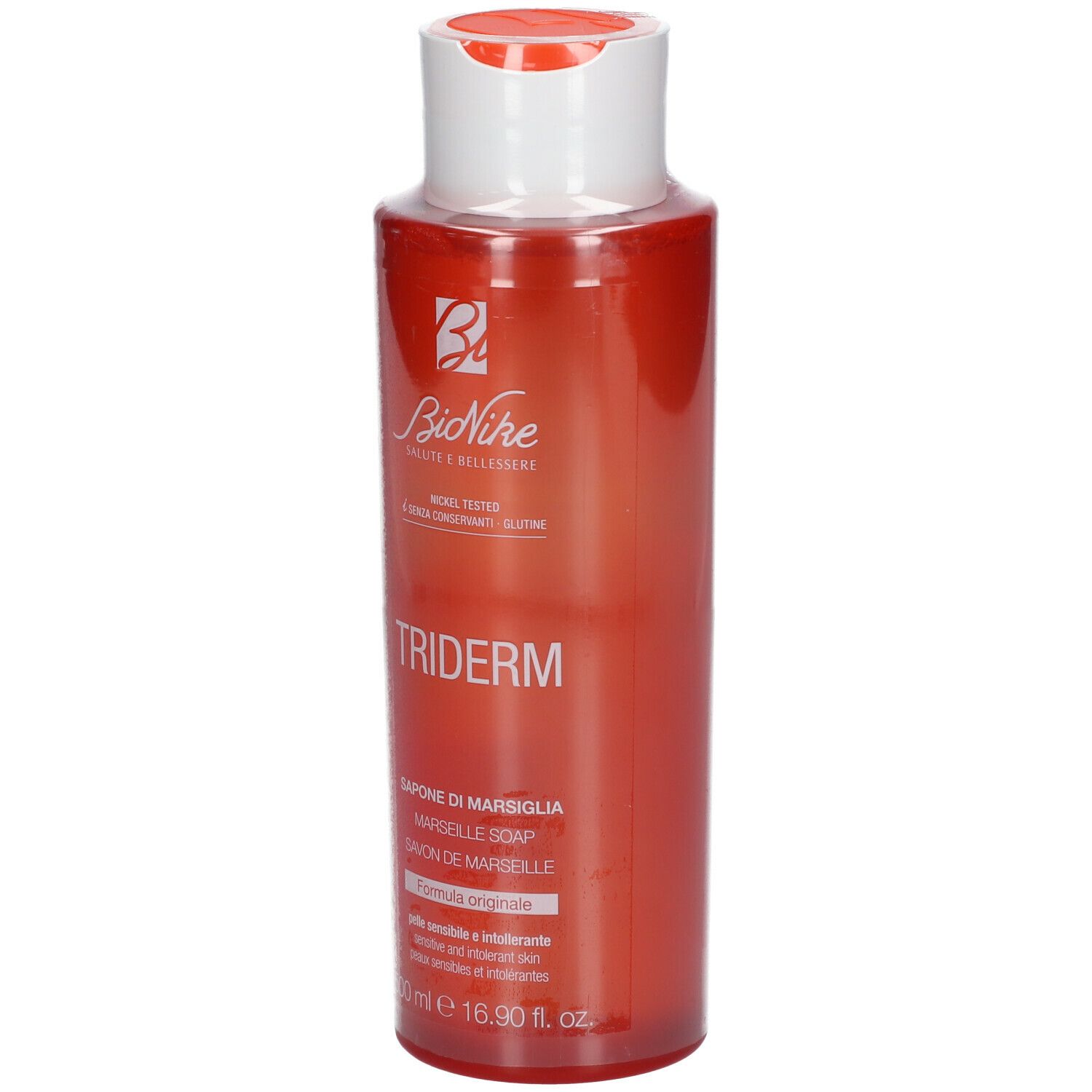 Flacon rouge avec bouchon blanc. Inscription: TRIDERM, Marseille Soap. Marque: BioNike.
