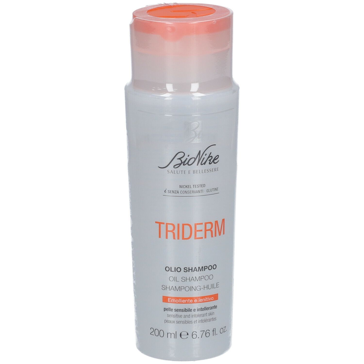 BioNike TRIDERM Shampoo-Olie. Witte fles met oranje dop. Tekst: TRIDERM, OIL SHAMPOO, 200 ml.