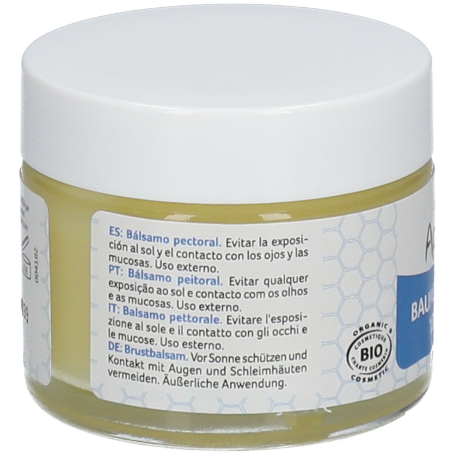 Pot rond avec couvercle blanc. Dos avec texte multilingue. Label bio et indication d'origine.