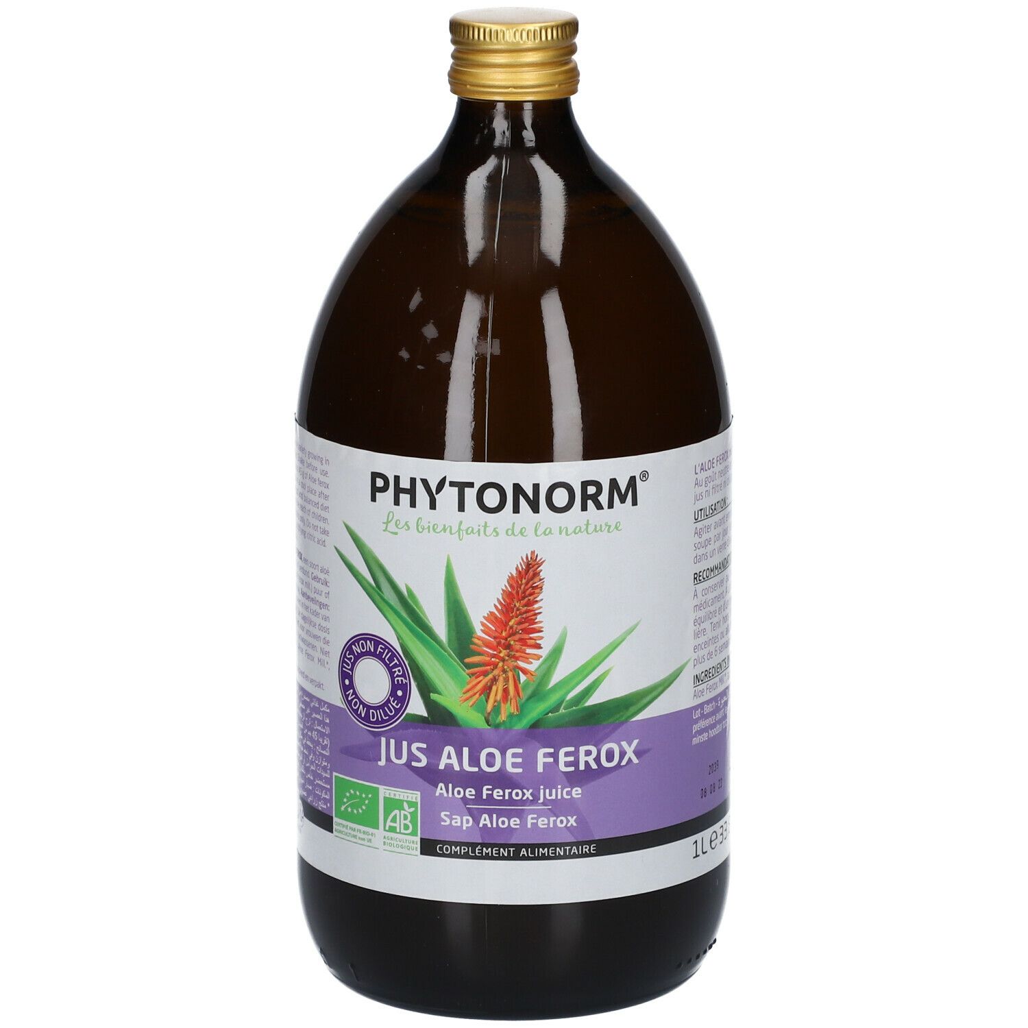 Bouteille en verre brun avec bouchon doré. Étiquette avec nom du produit et illustration d'aloe vera. Texte : Jus Aloe Ferox.