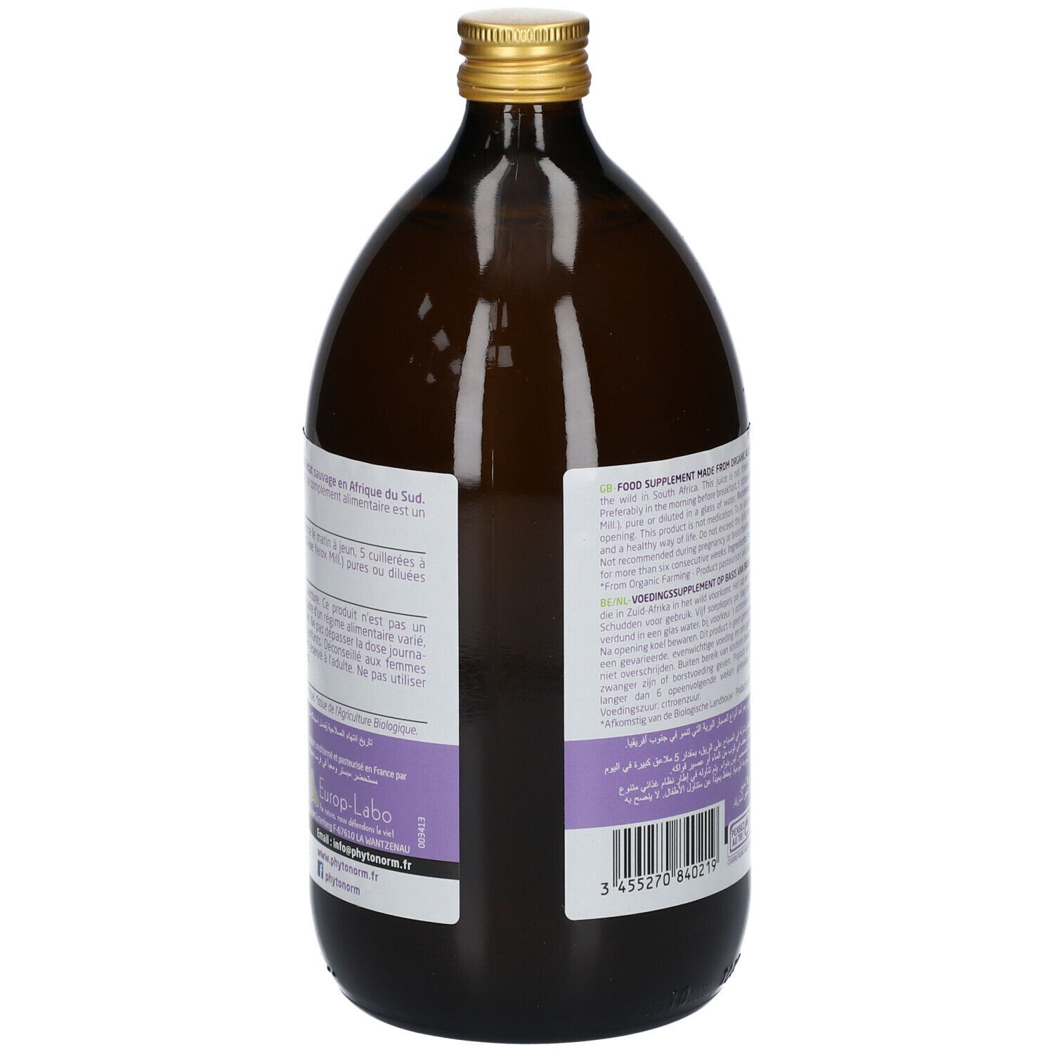 Dos de la bouteille en verre brun. Étiquette avec texte multilingue. Code-barres et certifications visibles.