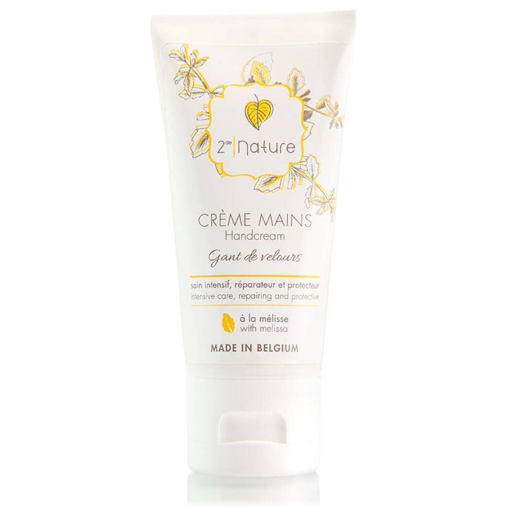 Handcrèmetube met bloemenontwerp en tekst. Crème Mains, Handcream, Gant de velours, à la mélisse, Made in Belgium.