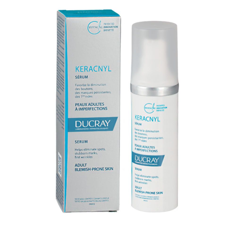 Sérum DUCRAY KERACNYL et emballage. Sérum blanc, emballage bleu. Texte: KERACNYL, Sérum, peaux à imperfections.