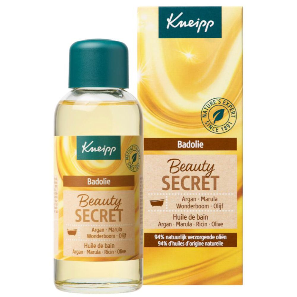 Flacon Kneipp Badeöl avec bouchon vert. Liquide jaune. Inscription : Beauty Secret. Avec certification.