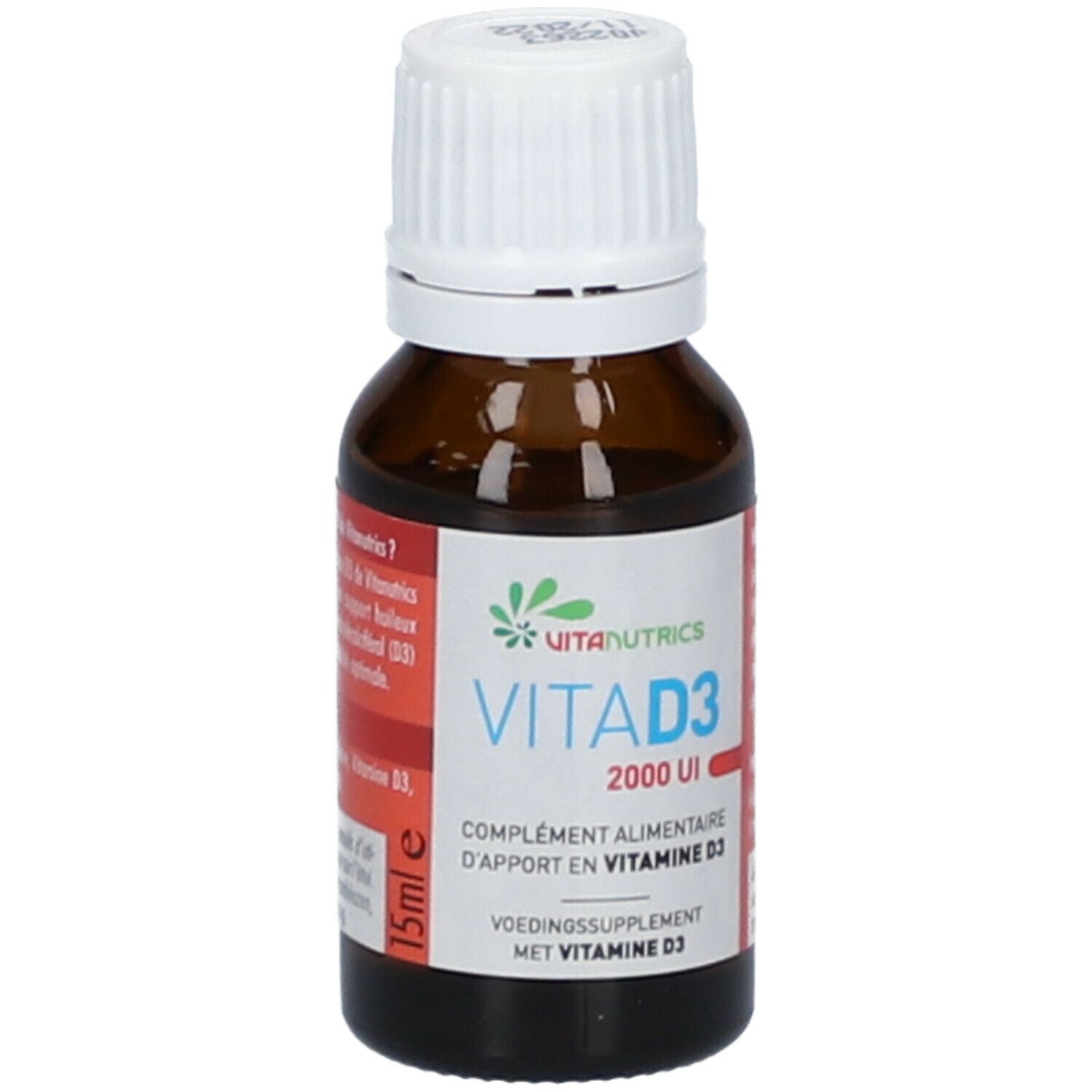 Bruine glazen fles met witte dop. Opschrift: Vitanutrics, VitaD3 2000 UI. Voedingssupplement met vitamine D3. 15ml.