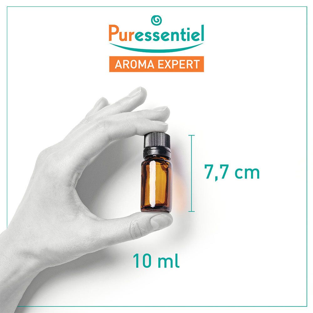 Hand hält eine braune Glasflasche mit 10 ml Bio-Grapefruitöl. Aufschrift: 10 ml, 7,7 cm.