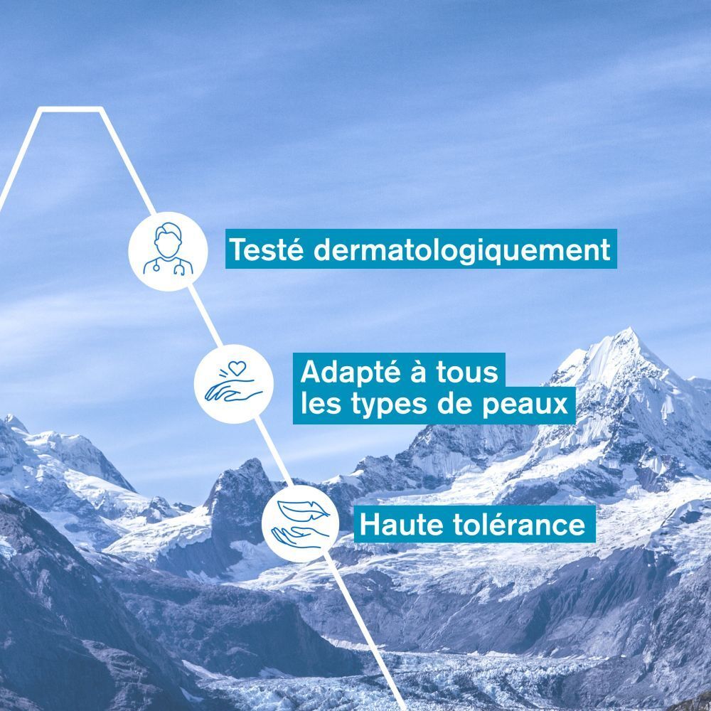 Texte: Testé dermatologiquement, Adapté à tous les types de peaux, Haute tolérance. Montagnes.