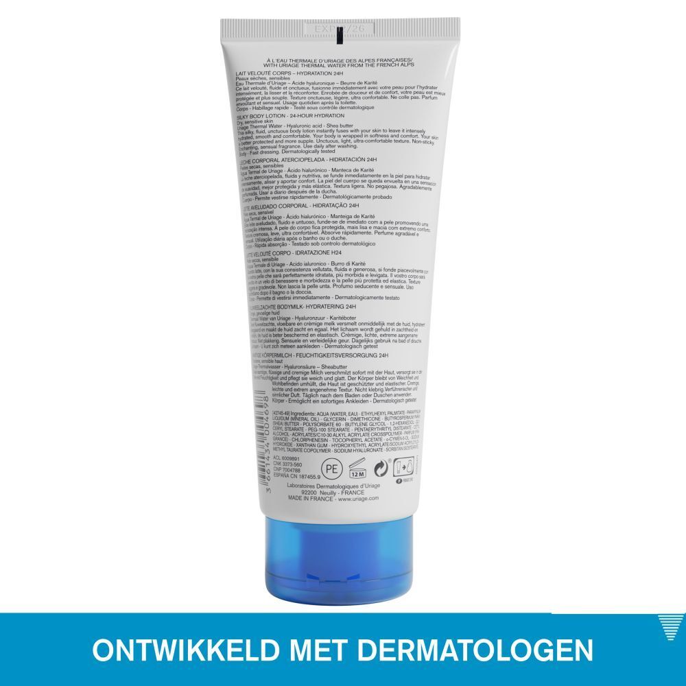 Achterkant van de tube. Meertalige tekst, waaronder Nederlands. Blauwe dop.