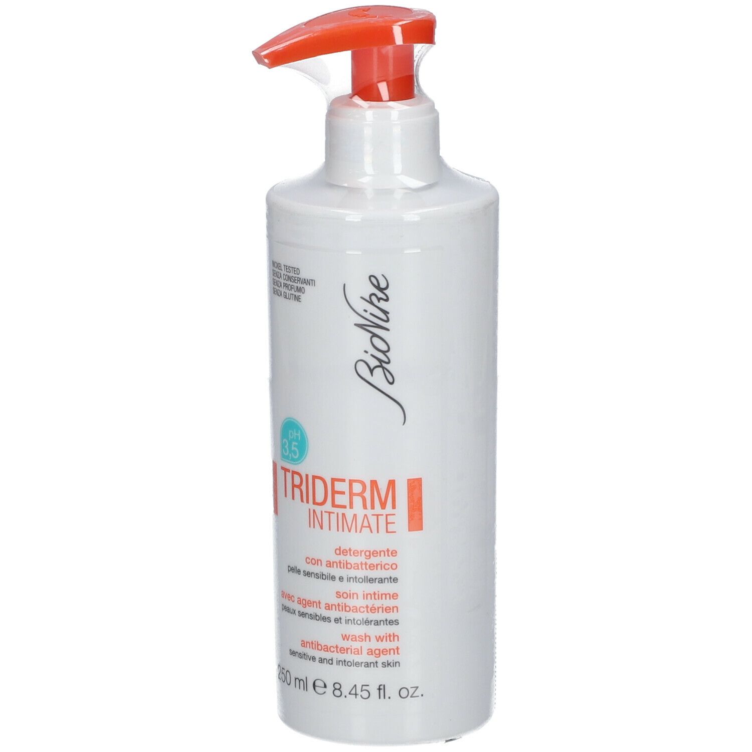 Witte dispenser met rode pomp. Opschrift: TRIDERM INTIMATE, pH 3.5, met antibacteriële stof. 250 ml.