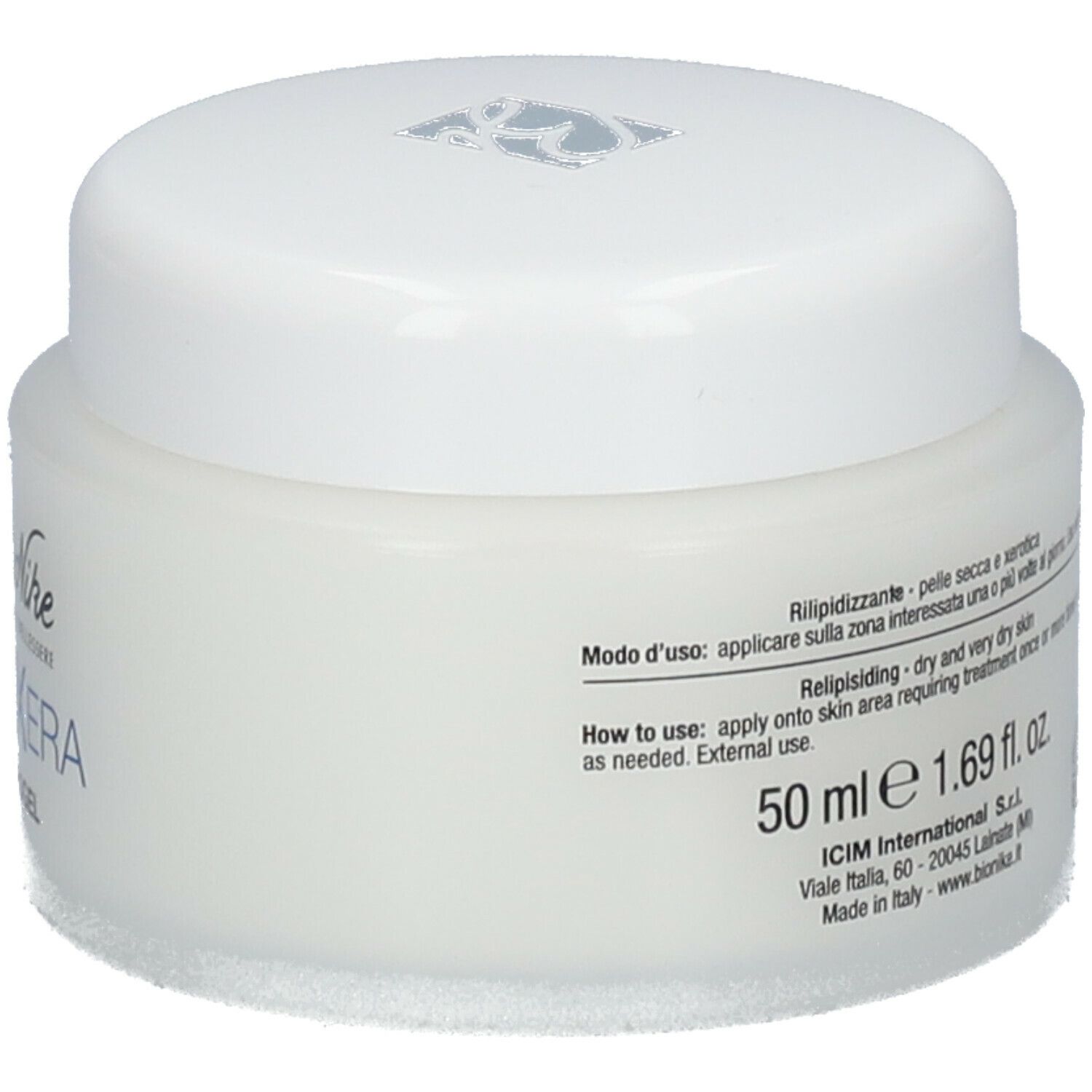 Witte pot met deksel. Opschrift: 50 ml, 1.69 fl. oz. Tekst in meerdere talen. Tekst: dry and very dry skin.