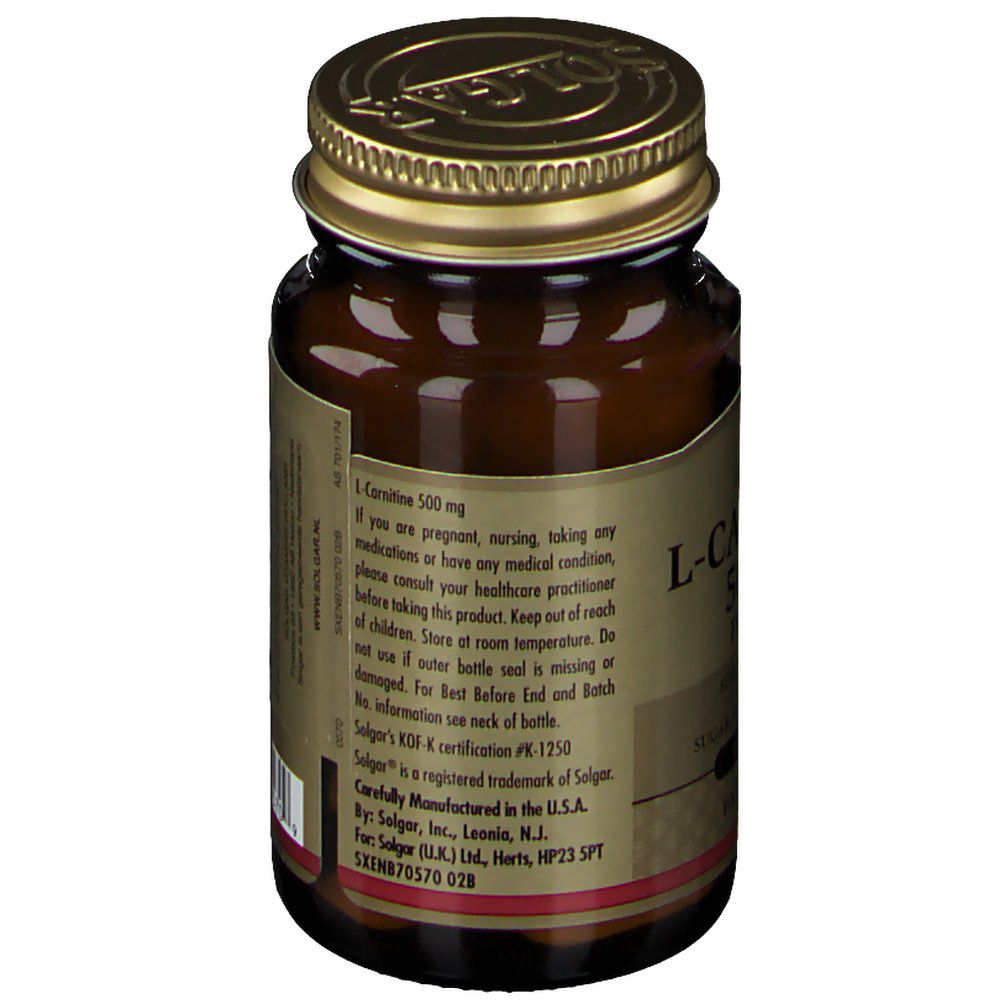 Achteraanzicht van bruine glazen fles met gouden dop. Etiket met productinformatie en fabrikant.