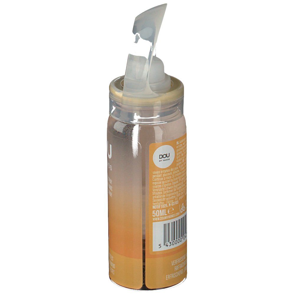 Flacon spray avec tête de pulvérisation ouverte. Inscription DOU, 50ml. Code-barres et avertissements. Dégradé de brun clair à jaune.