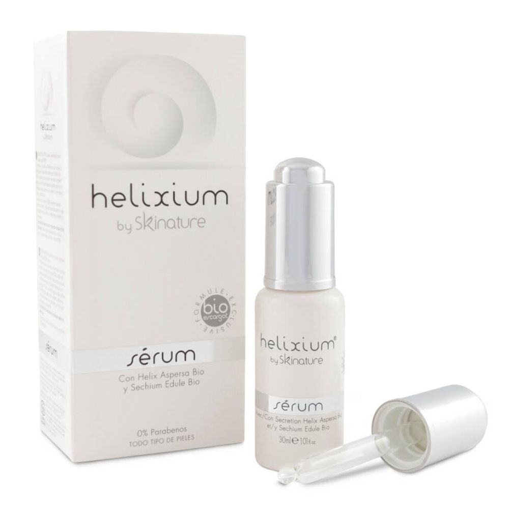 Flacon de sérum blanc avec pipette et emballage. Inscriptions : helixium by skinature, sérum, certification BIO.