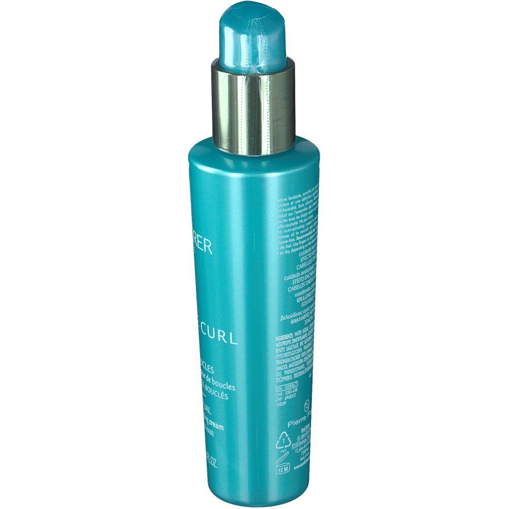 Flacon turquoise avec pompe. Texte au dos. Anneau doré sur la pompe.