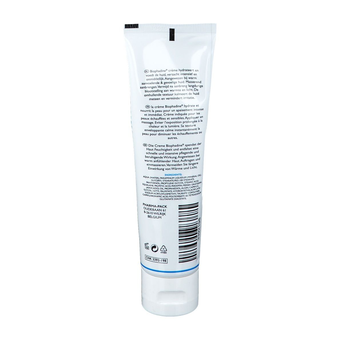 Dos d'un tube blanc. Texte multilingue. Code-barres et symboles. Fabriqué en Belgique.