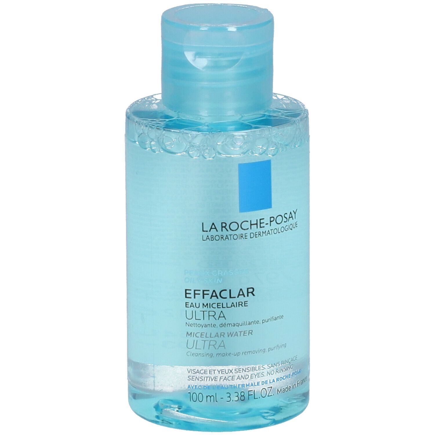 Flacon avec bouchon bleu. Inscription: LA ROCHE-POSAY EFFACLAR ULTRA Eau Micellaire. 100 ml - 3.38 fl.oz.