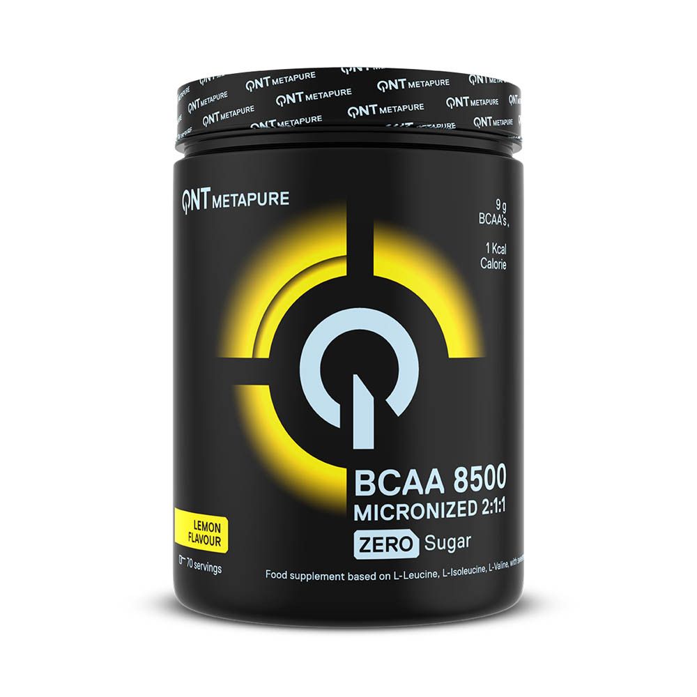 Boîte noire QNT Metapure BCAA 8500. Autocollant jaune 'Citron'. Inscription : 9g BCAA, 1 calorie, 0 sucre.